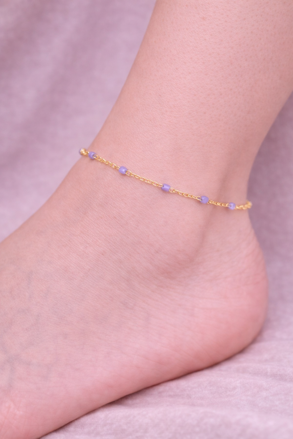 Kette Dotty lila gold Fusskette
