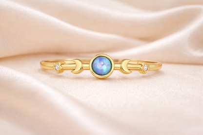 Ring Galaxy in Gold mit blau-violettem Stein
