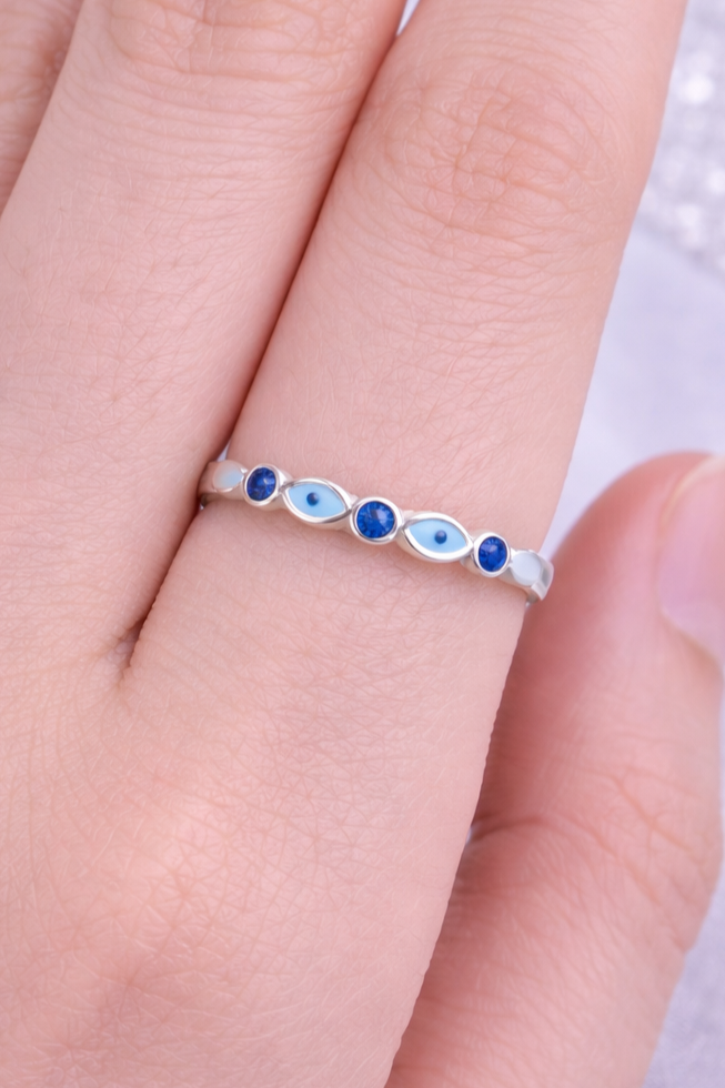 Silberner Ring lucky mit blauen Ziersteinen